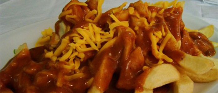 Chips , Cheese & Curry Sauce 